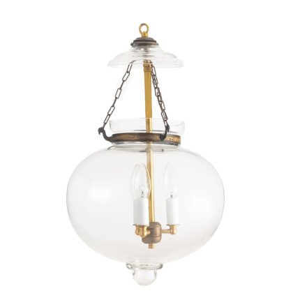 Large plain clear glass onion lantern chandelier with antique brass finish hanging in an entryway