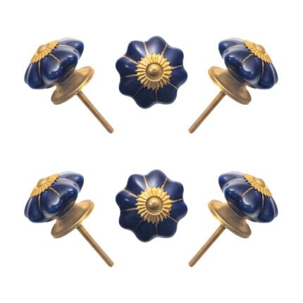 Deep blue ceramic multi-lobed knobs with antique brass accents in a set of 6